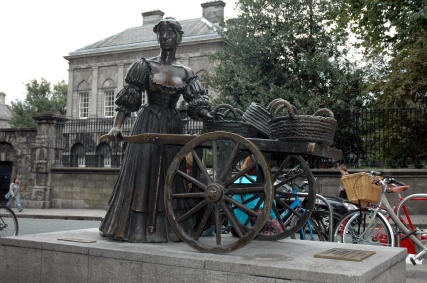 Officially she is named Molly Malone, from an old Irish folk song of the same name.  Unofficially, she is called "The Tart with the Cart".